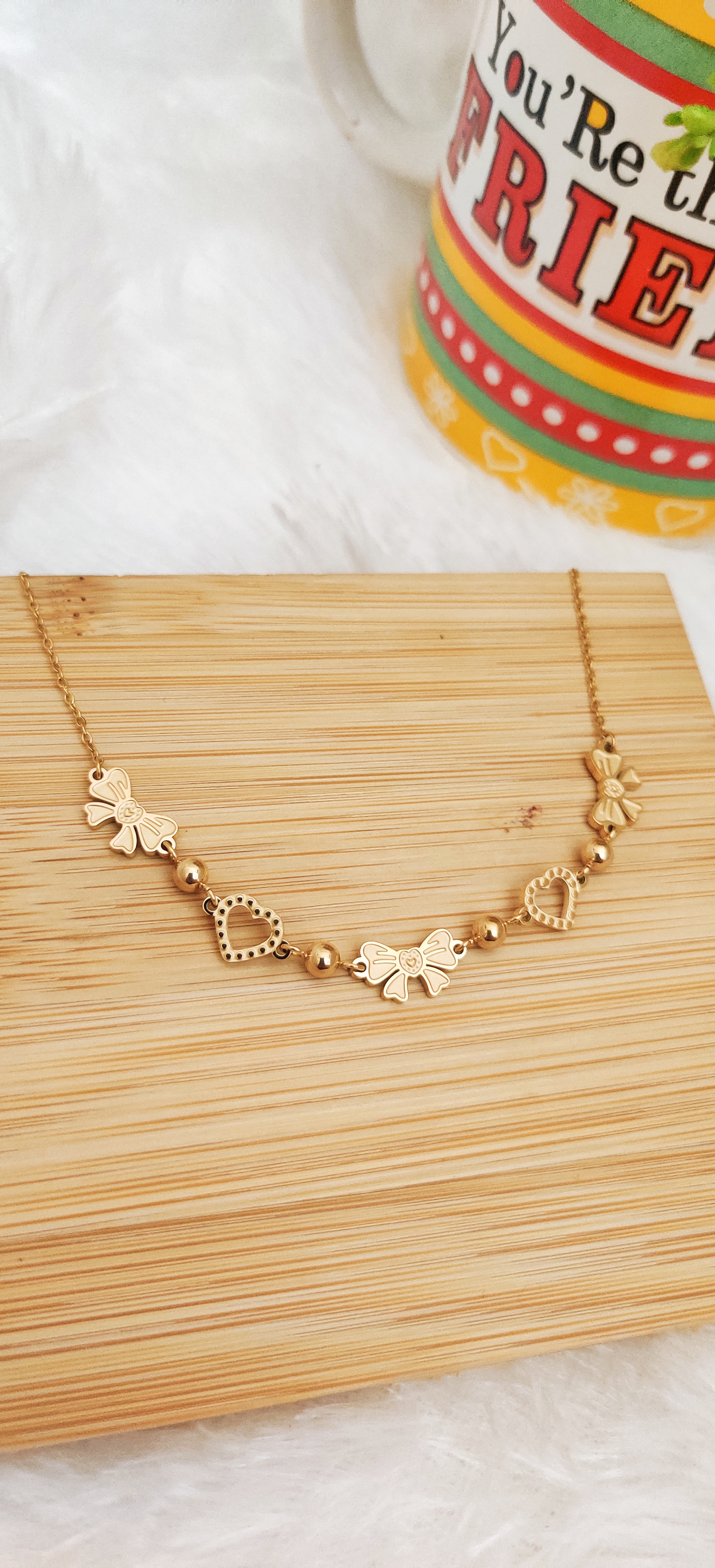 Gold Bow & Heart Motif Necklace
