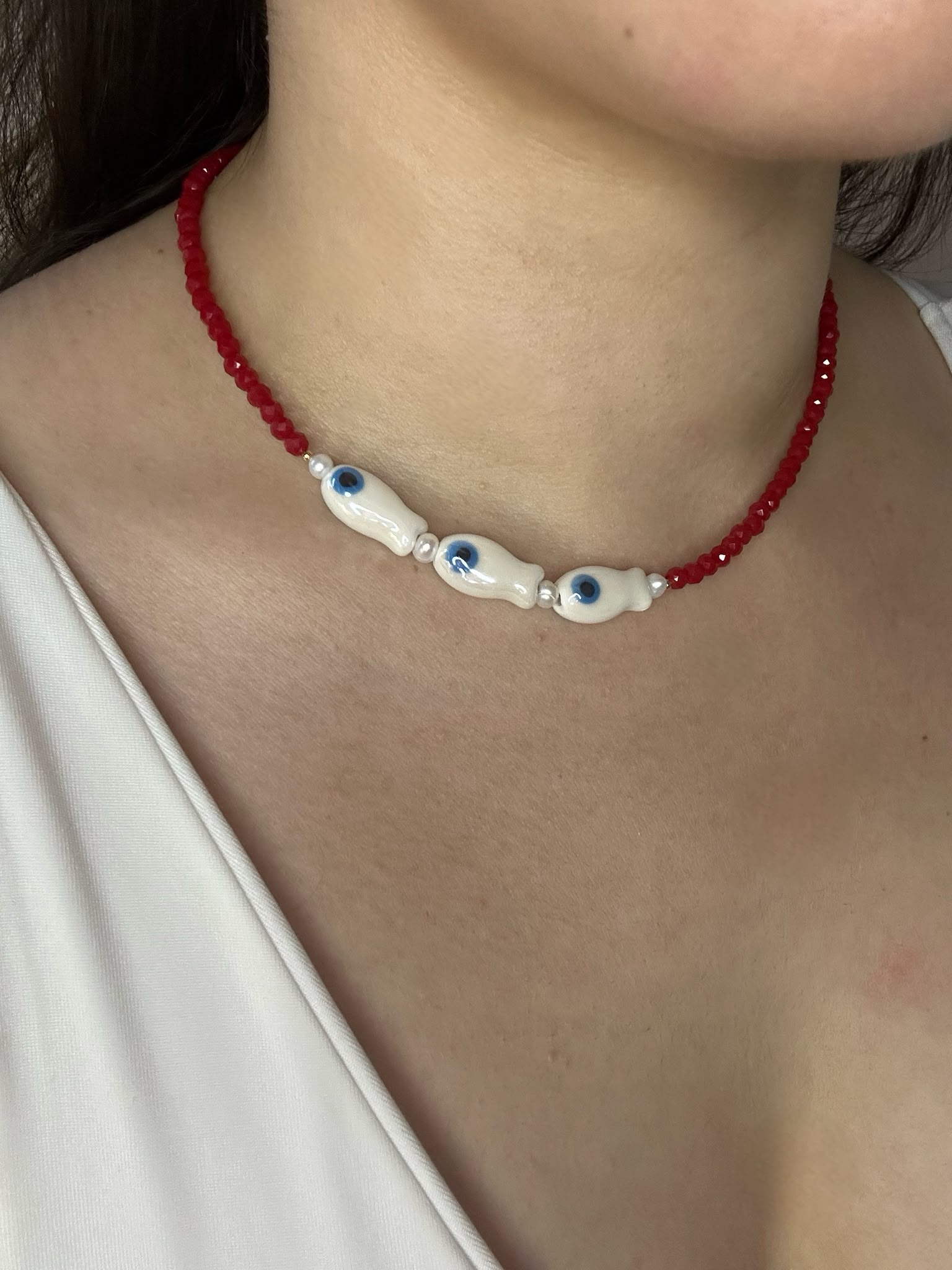 Necklace "Aligned" with red or white Czech crystals and porcelain fish charms