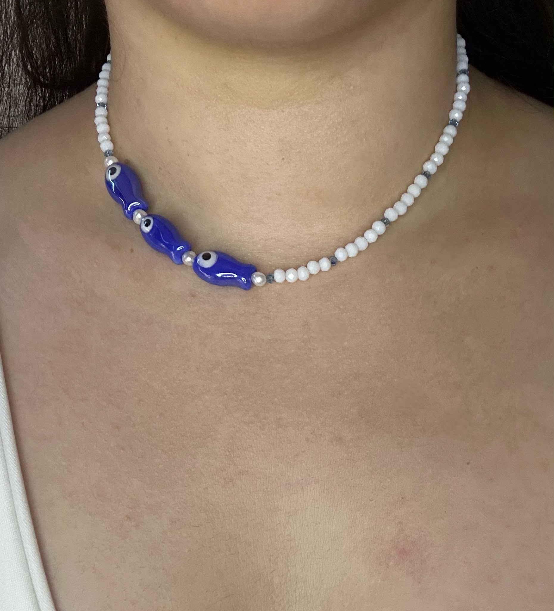 Necklace "Aligned" with red or white Czech crystals and porcelain fish charms