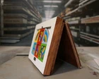 Frank Stella  recreations in miniature covering his "Protractor" series and Maximalism utilizing a custom collage from an original work with wood. 