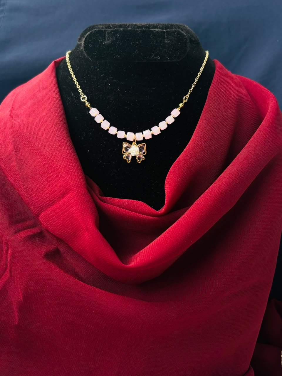 Elegant Bow with Pearl Bead Pendant