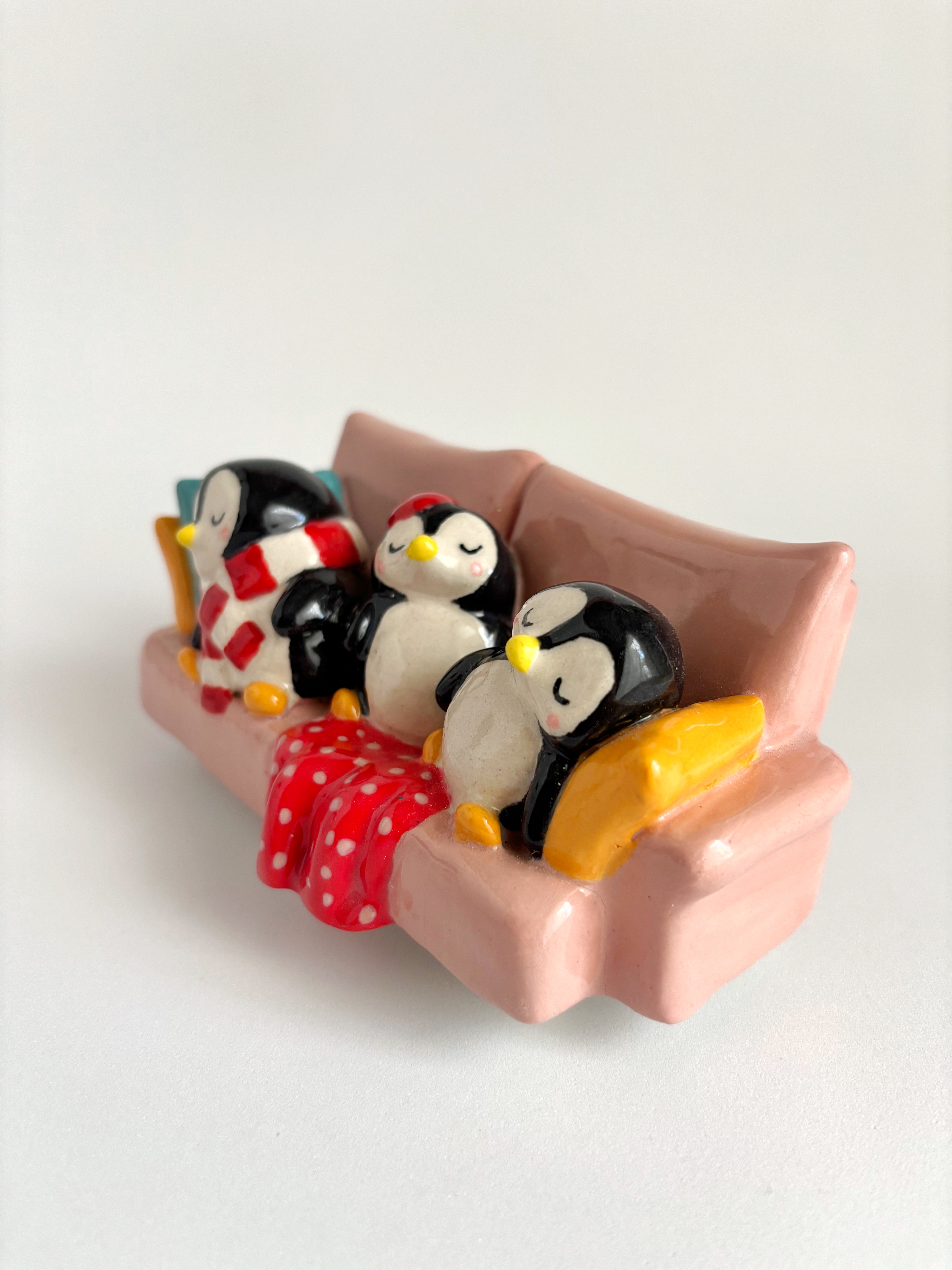 Three Penguins, One Sofa, Endless Dreams