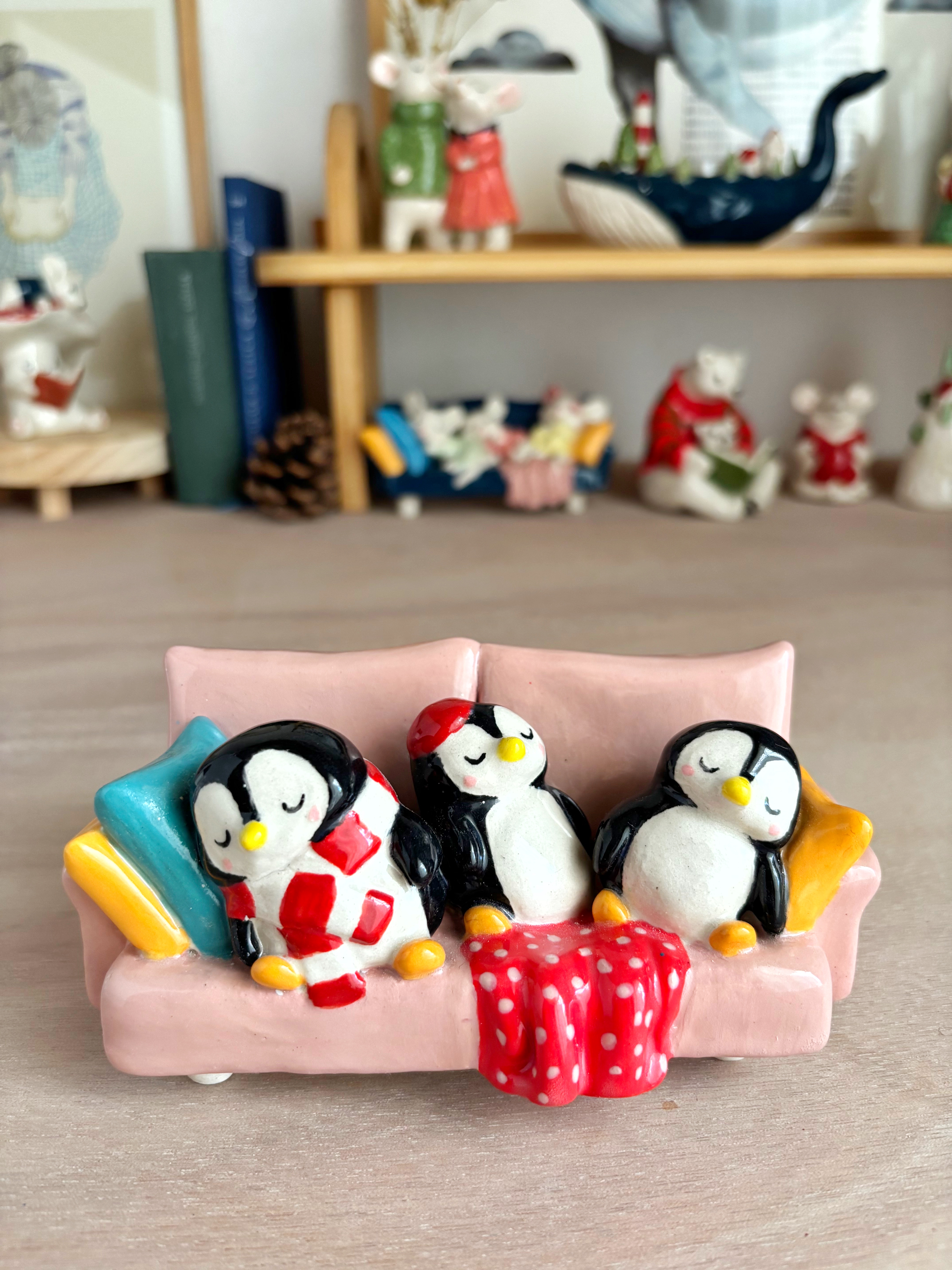 Three Penguins, One Sofa, Endless Dreams