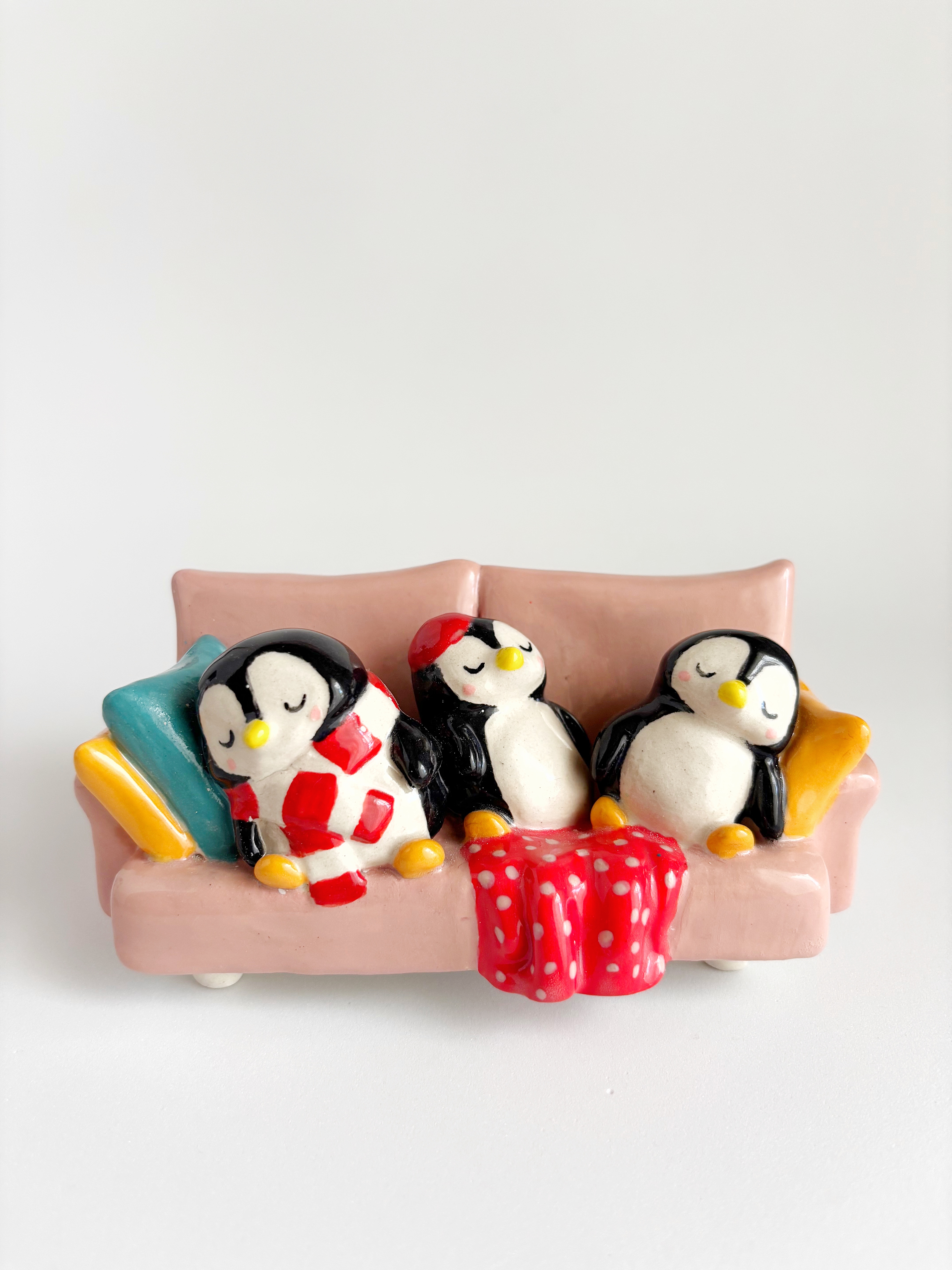 Three Penguins, One Sofa, Endless Dreams