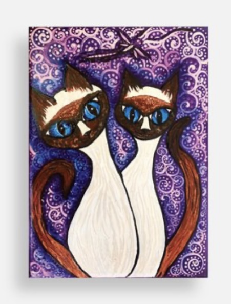Mischievous Siamese Cat duo