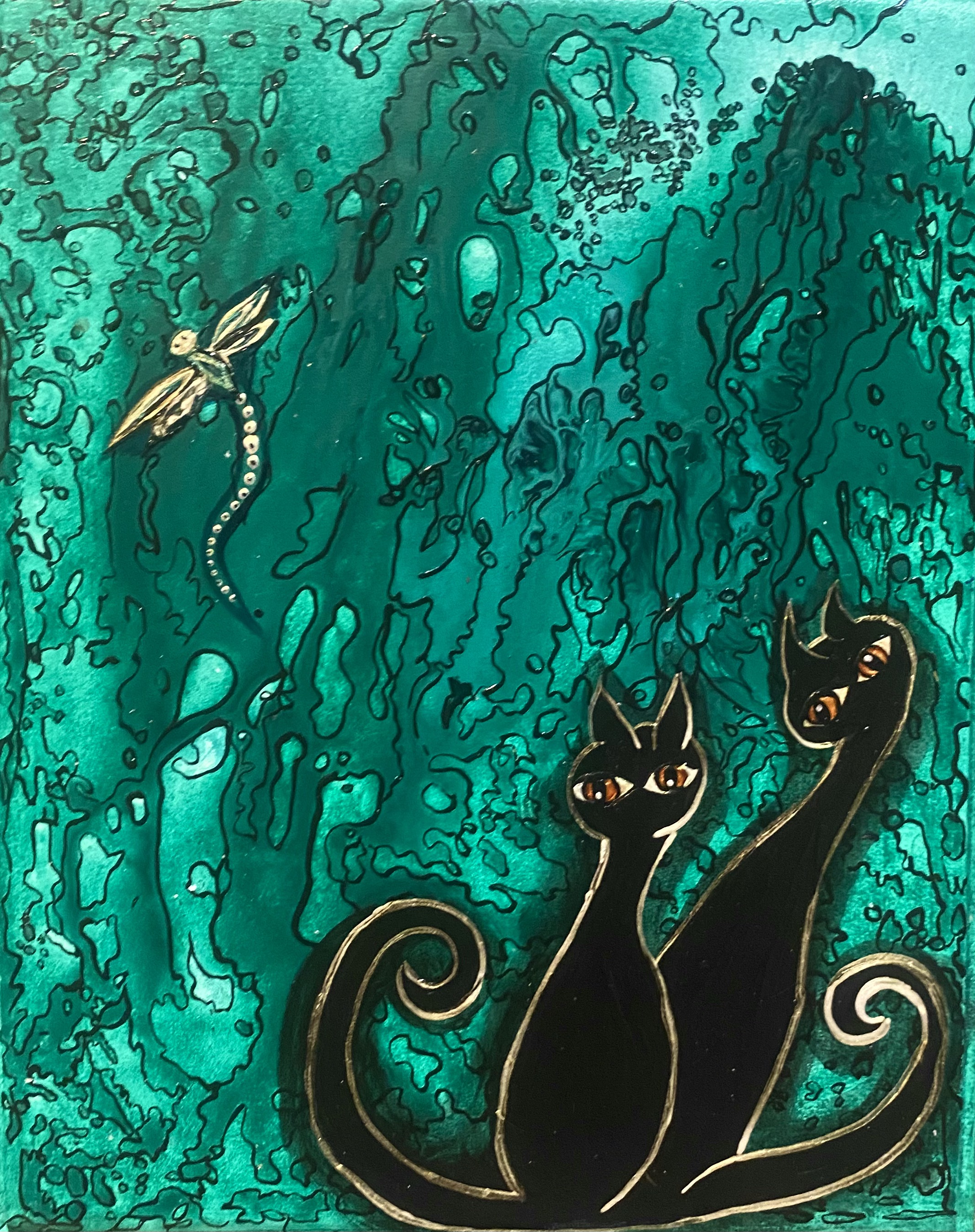 Black cat duo in green