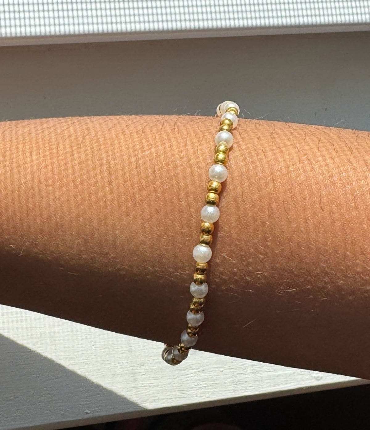 Pearl and gold bracelet
