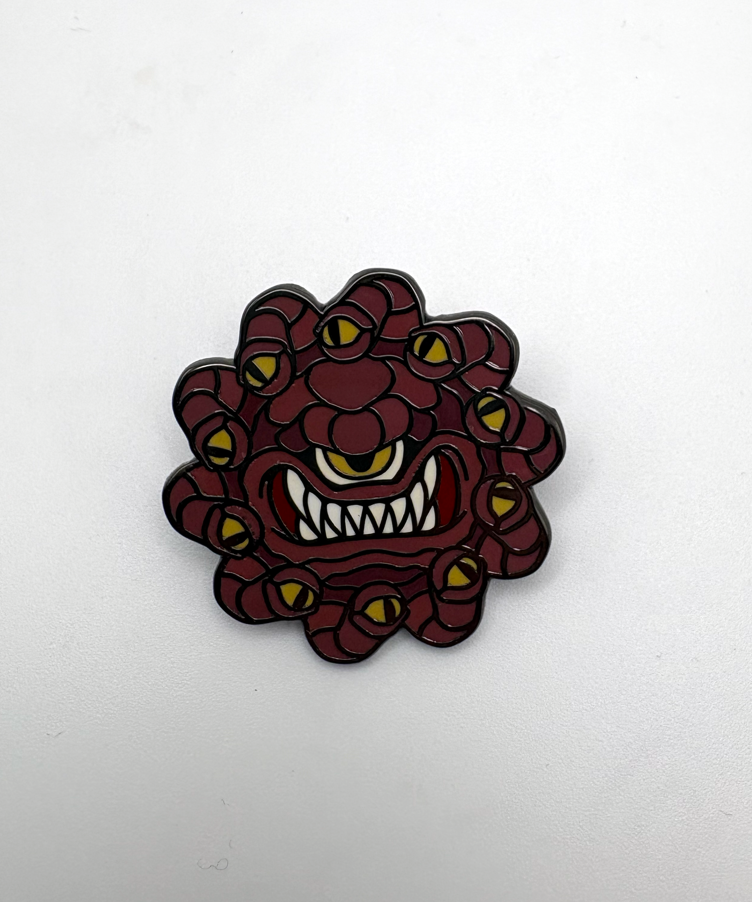 Beholder Enamel Pin