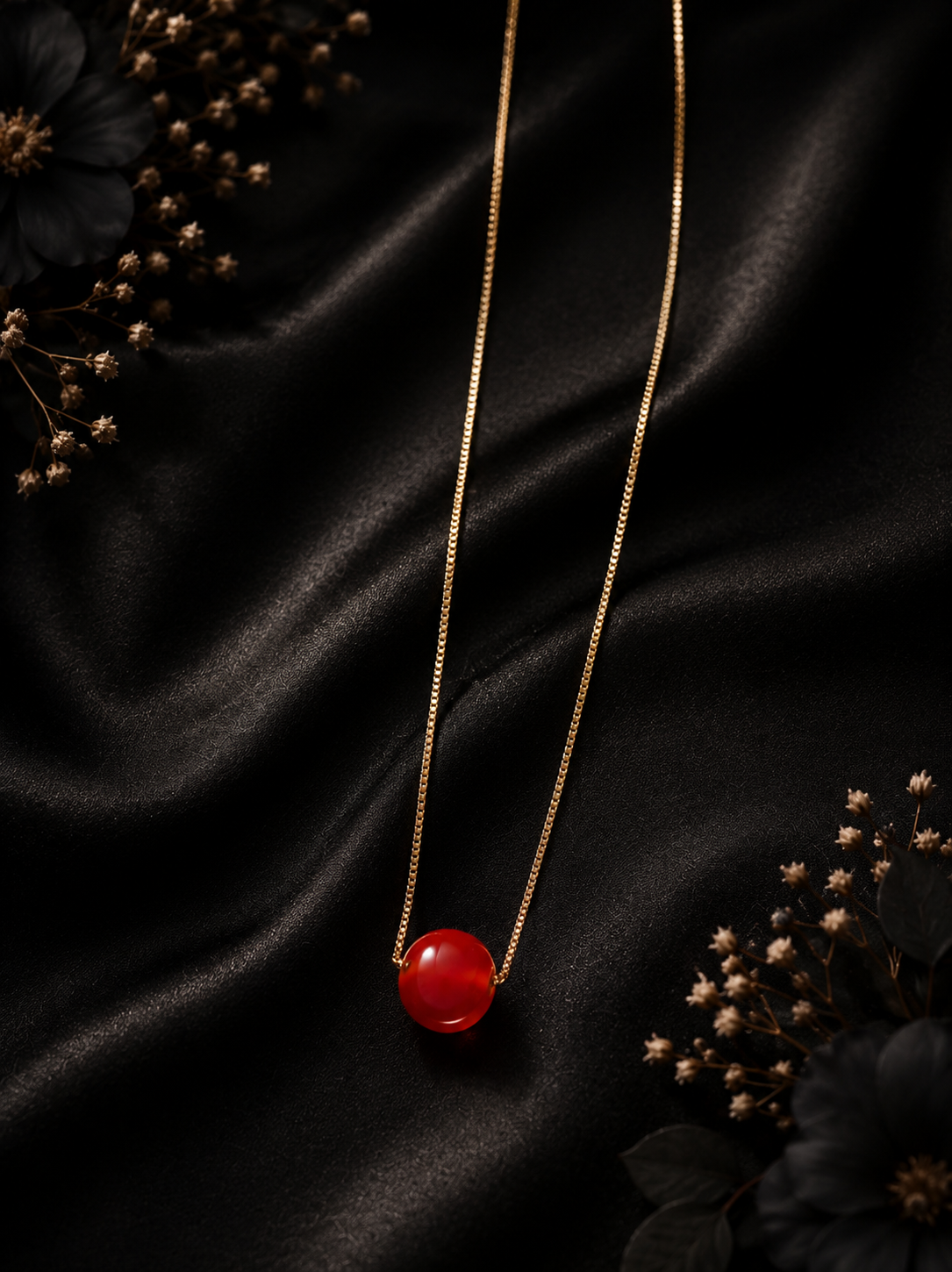 Elegant Gold Necklace with Red Gem