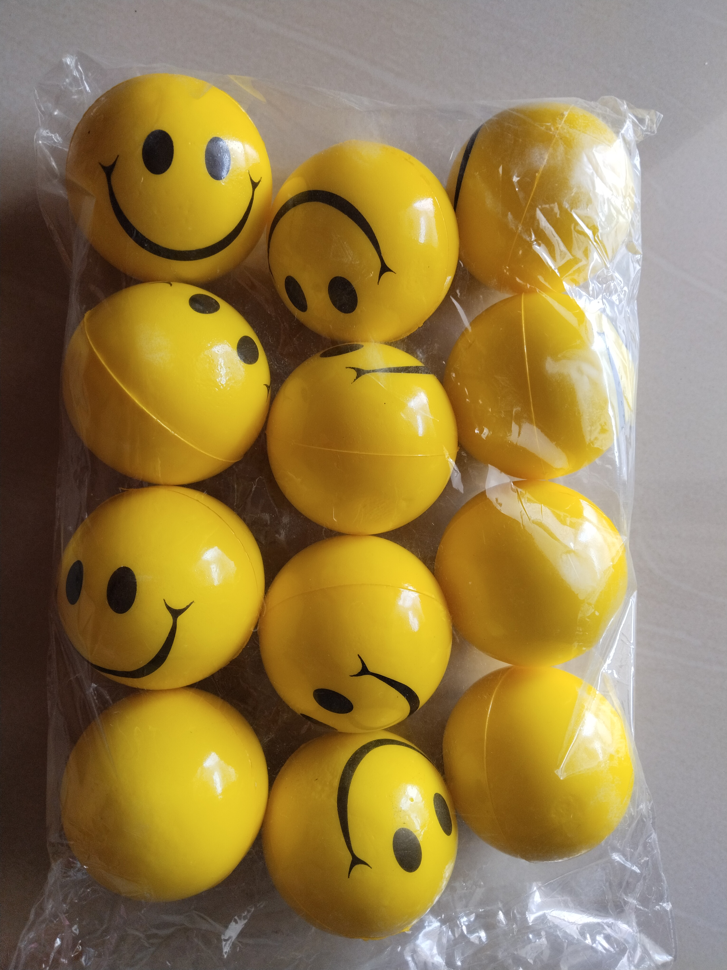 Smiley Face Ball - A soft foam toy for kids - Stress reliever squeeze ball- Hand Exercise soft happy face smiley balls (Pack of 12)