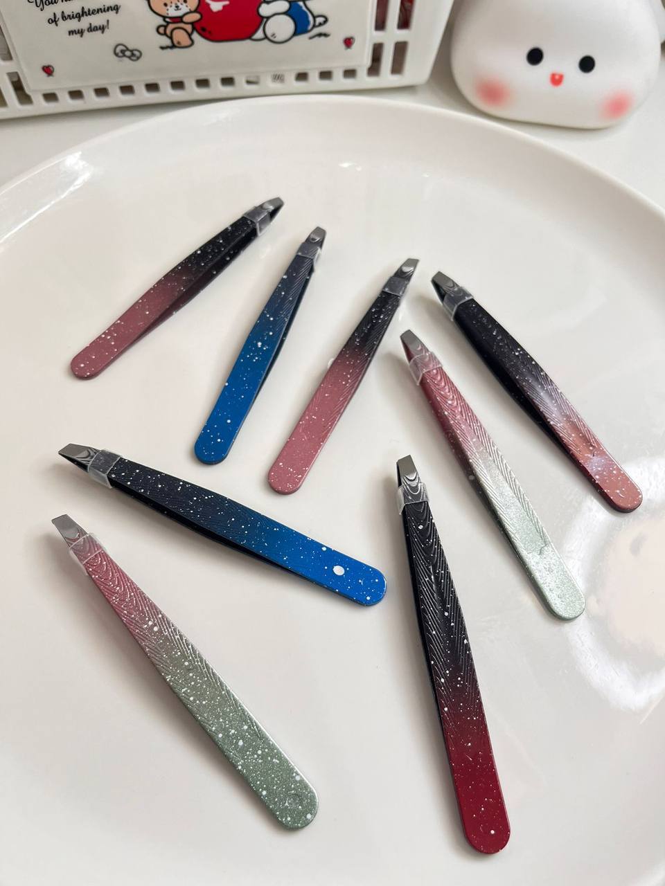 Pinza para sacar cejas