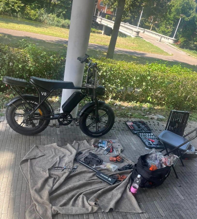 Repairing a flat front tire and mounting new Kenda tires on the front wheel of a fatbike.